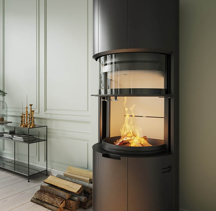 Detail image of Black wood stove Scan 87 with lifting door in light green room with black aluminum shelf and wood in the background