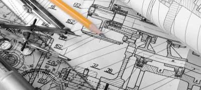 Teknisk tegning detalj med blyant, linjal og passer liggende ovenpå